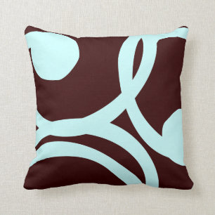 teal and brown abstract pattern pillow