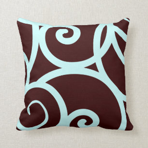 teal and brown abstract pattern pillow