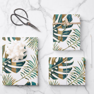 Teal and gold patterned tropical leaves wrapping paper sheet