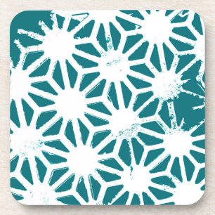Teal and white geometric pattern coaster
