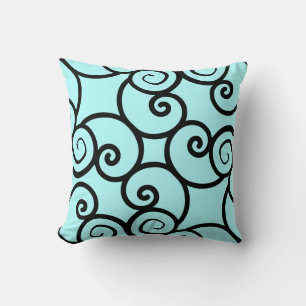 teal background and black abstract pattern pillow