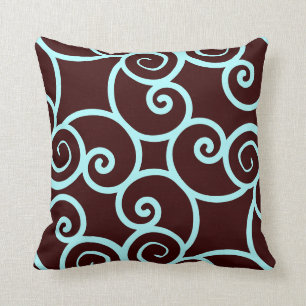 teal background and brown abstract pattern pillow