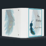 Teal Blue Peacock Plume Wedding Album Binder<br><div class="desc">This beautiful and elegant design, called Teal Blue Peacock Plume Wedding, has a bright white background with a teal border. In the background is a pale peacock tail feather with a full peacock illustration in the lower right corner. This would be perfect for your wedding or event! This set has...</div>