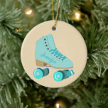 Teal Blue Retro Quad Roller Skate Photo Ceramic Ornament<br><div class="desc">Show them how you roll! This custom Christmas ornament features a realistic style illustration of a classic quad roller skate in teal against a tan background on the front. It's ready to be personalized with a name in coordinating script lettering on the side of the skate. The reverse side is...</div>
