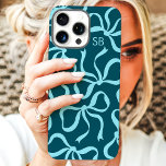Teal Bow Monogram iPhone 16 Pro Max Case<br><div class="desc">Dress up your phone in style with this chic and trendy teal phone case! Featuring a playful pattern of hand-drawn bows and personalized with your monogram, this case is the perfect blend of fashion and function. Made from durable materials to protect your phone from everyday bumps and scratches. A great...</div>