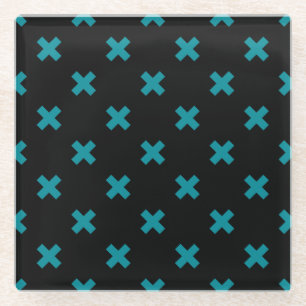 Teal cross stitches on black glass coaster