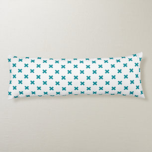Teal cross stitches on white body pillow