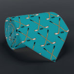 Teal Crossed Hockey Sticks and Puck Tie<br><div class="desc">teal Crossed Hockey Sticks and Puck tie</div>