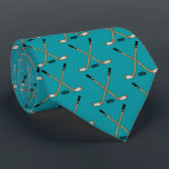 Teal Crossed Hockey Sticks and Puck Tie<br><div class="desc">teal Crossed Hockey Sticks and Puck tie</div>