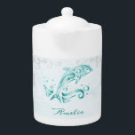 Teal Dolphin Personalized Teapot<br><div class="desc">Enjoy your tea with a Teal Dolphin Personalized Teapot.  Teapot design features a vibrant metallic dolphin against a muted seascape adorned elegant scrolls with an area to personalize with your name.  Additional gift items available with this design as well as a variety of colours.</div>