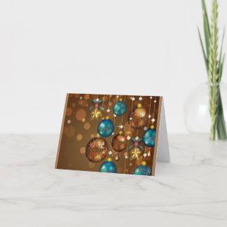 Teal et carte de Noël accrochante d'ornements d'or