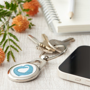 Teal heart dragon on white keychain