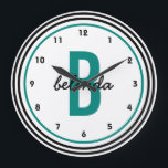 Teal Monogram Black and White Personalized Large Clock<br><div class="desc">A bold,  modern,  personalized custom wall clock for men or women. Bold black and teal circles  highlight a jumbo sized teal coloured monogram and casual handwriting font first name in black. Other colours,  styles and designs available in the Party Hearty store.</div>