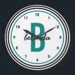 Teal Monogram Black and White Personalized Large Clock<br><div class="desc">A bold,  modern,  personalized custom wall clock for men or women. Bold black and teal circles  highlight a jumbo sized teal coloured monogram and casual handwriting font first name in black. Other colours,  styles and designs available in the Party Hearty store.</div>
