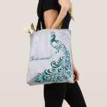 Teal Peacock Leaf Vine Bridesmaid Tote<br><div class="desc">Personalize a all over print bag for your bridesmaids with a Teal Peacock Leaf Vine Bridesmaid's Tote Bag. Tote design features a light grey grunge background with a vibrant teal peacock with a leaf vine embellishment. Personalize with the bridesmaid's name or keep the bridesmaid title. Additional wedding stationery and gifts...</div>