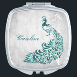 Teal Peacock Leaf Vine Compact Mirror<br><div class="desc">Personalize a unique gift for your Bridesmaids with a Teal Peacock Leaf Vine Compact Mirror. Compact design features a light grey grunge background with a vibrant teal peacock with a leaf vine embellishment. Personalize with the bridesmaid's name for a cherished reminder of your big day. Additional wedding stationery available with...</div>