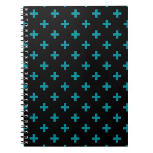 Teal polka crosses on black notebook