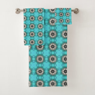 teal towels featuring a black and white geometric