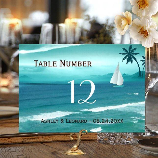 Teal Tropical Beach Wedding Table Number Card (Wedding table number card with a painting of a tropical ocean with a sailboat in teal turquoise blue)