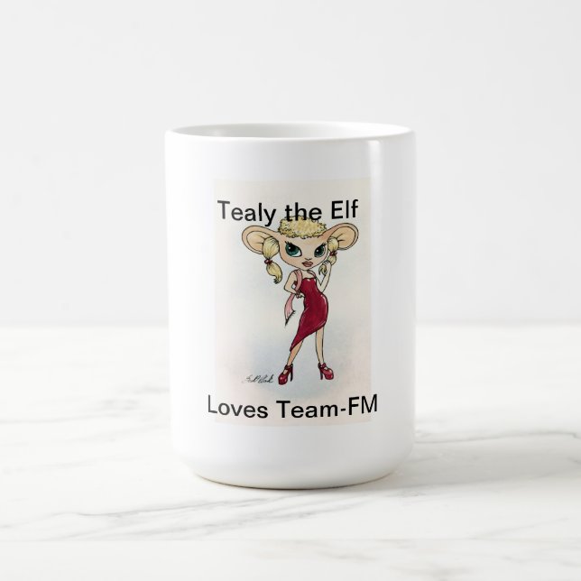 Tealy l'elfe aime la tasse d'Équipe-FM (Centre)