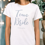 Team Bride Wedding Personalized Dusty Blue T-Shirt<br><div class="desc">Celebrate your bride squad with this personalized wedding t-shirt! The words 'Team Bride' are written in a trendy script font, and below you can add a custom name, wedding date, location or other text. A lovely gift for a bachelorette party, wedding shower or celebration weekend! Colours: dusty blue and white....</div>