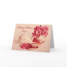 Teapot, a cup of tea and rose