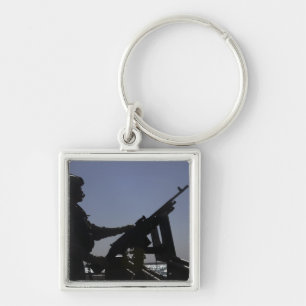 Technician manning an M240 machine gun in Iraq Keychain