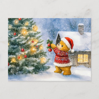 Teddy Bear Decorating a Christmas Tree in snowing Postcard