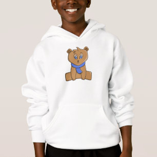 Teddy bear wearing a blue scarf