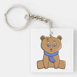 Teddy bear wearing a blue scarf keychain