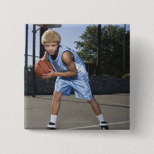 Teenage boy on basketball court 2 inch square button