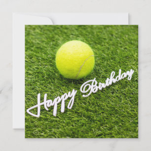 Tennis ball with happy birthday word on green card