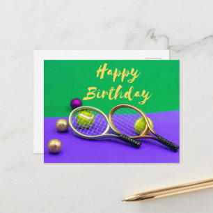Tennis ball with happy birthday word on green post postcard