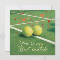 Tennis ball with LOVE on blue court