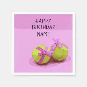 Tennis ball  with pink ribbon on pink birthday   napkin