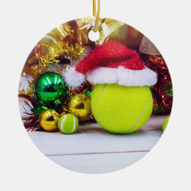 Tennis ball with Santa hat for Christmas Holiday Ceramic Ornament (Front)
