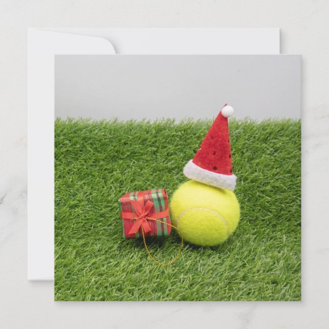 Tennis Christmas with tennis ball and Santa hat Holiday Card (Front)