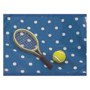Tennis racket & ball on white polka dots blue tablecloth