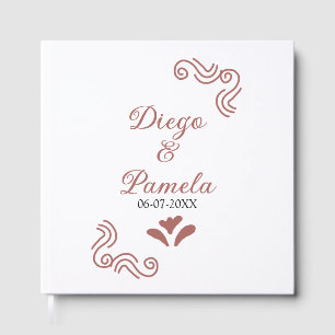 Terracotta black rustic spanish wedding couple en guest book