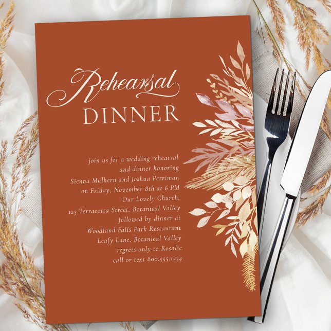 Terracotta Botanical Wedding Rehearsal Dinner Invitation (Terracotta Rehearsal Dinner invitation with calligraphy and neutral fall foliage on burnt orange)