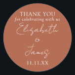 Terracotta Elegant Script Wedding Thank You Classic Round Sticker<br><div class="desc">This terracotta minimalist elegant script wedding thank you sticker can be personalized with your information in chic typography. Designed by Thisisnotme©</div>