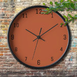 Terracotta Orange Solid Colour Warm & Earthy Desig Clock<br><div class="desc">The Terracotta Orange Solid Colour pattern is a timeless and versatile design that radiates warmth and natural elegance. This rich, earthy shade of orange adds a sense of coziness and sophistication to any project, making it a perfect choice for fashion, home decor, textiles, and graphic design. Its deep, muted tone...</div>
