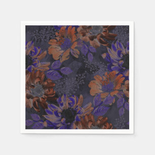 Terracotta, purple flowers on a velvety grey napkin