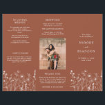 Terracotta Rustic Fall Wildflower Wedding Program<br><div class="desc">Guide your guests through your big day with this rustic terracotta floral wedding tri fold program. Featuring delicate fall wildflowers and a clean,  elegant layout. Perfect for an outdoor autumn ceremony or a barn wedding celebration.</div>