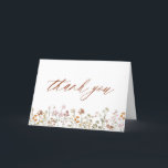 Terracotta Wildflower Bridal Shower Thank You Card<br><div class="desc">Express your gratitude with our Terracotta Wildflower Bridal Shower Thank You Card. This beautifully designed card captures the essence of nature's charm, featuring vibrant wildflowers against a warm terracotta backdrop. The delicate wildflowers symbolize the beauty and uniqueness of each moment shared during the bridal shower. The terracotta colour palette adds...</div>