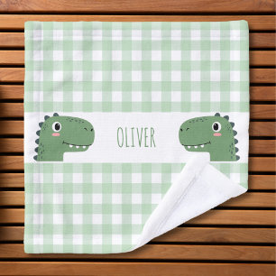 Tête de dinosaure vert mignon à carreaux