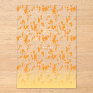 Textile pattern featuring a vibrant orange and gol acrylic invitations