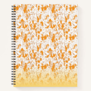 Textile pattern featuring a vibrant orange and gol notebook