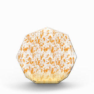 Textile pattern featuring a vibrant orange and gol photo block