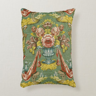 Textile with a repeating floral motif decorative pillow